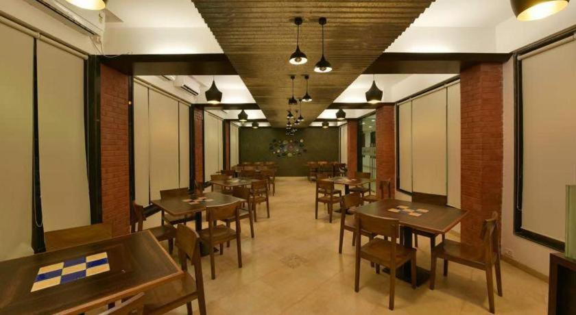 Marigold Stay Jambhulpada Bagian luar foto