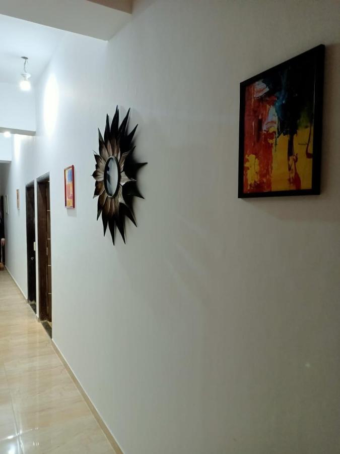 Marigold Stay Jambhulpada Bagian luar foto