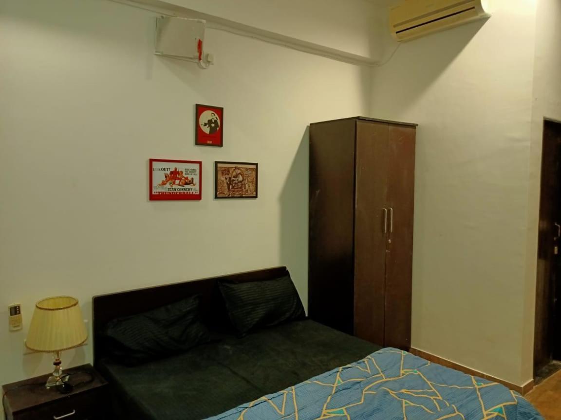Marigold Stay Jambhulpada Bagian luar foto