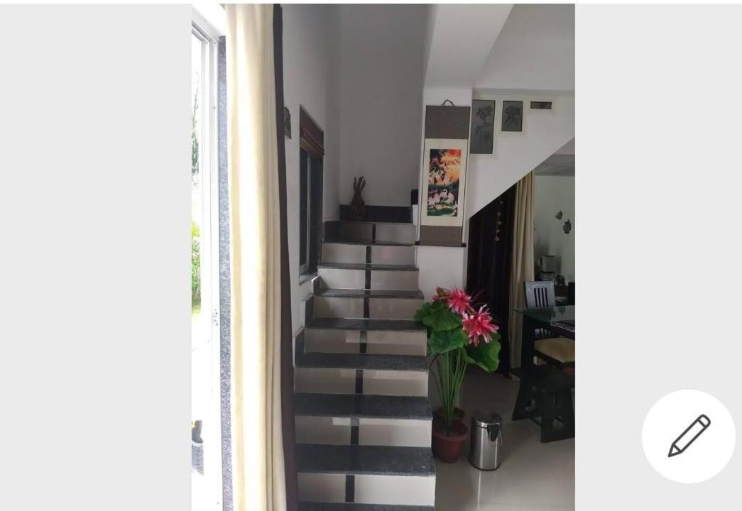 Marigold Stay Jambhulpada Bagian luar foto
