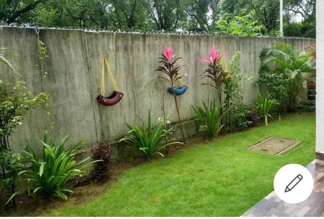 Marigold Stay Jambhulpada Bagian luar foto
